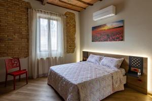 Posteľ alebo postele v izbe v ubytovaní Elegante Casa Mafalda con vista