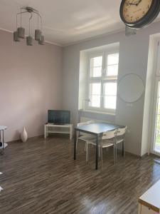 Posedenie v ubytovaní Apartament Centrum Msciwoja