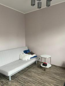 Posteľ alebo postele v izbe v ubytovaní Apartament Centrum Msciwoja