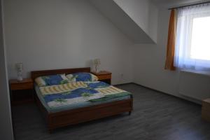 Postel nebo postele na pokoji v ubytování Ubytování u Kolářů