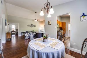 a dining room and living room with a table in a room at Sunny Lemon in Middleburg