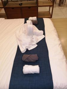 Katil atau katil-katil dalam bilik di Timurbay Seafront Residence