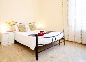 Ένα ή περισσότερα κρεβάτια σε δωμάτιο στο InnPisaRentals - Santa Maria Flat