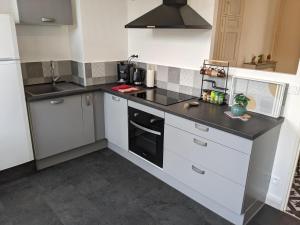 Cuisine ou kitchenette dans l'établissement Appartement au cœur du centre ville de Blois