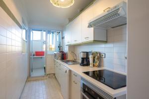 Η κουζίνα ή μικρή κουζίνα στο Apartment with Swimming-pool