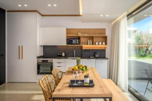 Kuchyň nebo kuchyňský kout v ubytování Talise I Luxury Suites