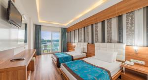 TV a/nebo společenská místnost v ubytování Amon Hotels Belek - Adult Only