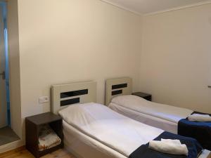 Postel nebo postele na pokoji v ubytování Hotel Lemi