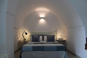 Una cama o camas en una habitación de Angolo di Puglia 90 fotos más