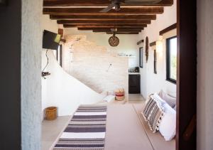Postel nebo postele na pokoji v ubytování Villa Los Mangles Boutique Hotel