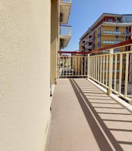 an empty balcony of a building with buildings in the background at Tiny house via mascilongo in Termoli