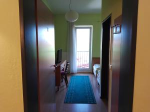 A bed or beds in a room at Pension Kappel