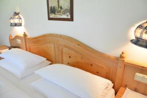 Postel nebo postele na pokoji v ubytování Seehotel Huber