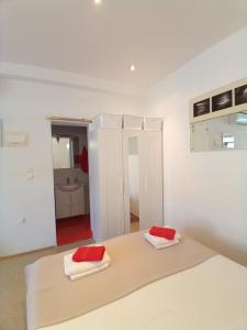 Posteľ alebo postele v izbe v ubytovaní Beachfront Love Nest