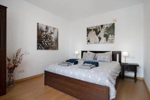 En eller flere senge i et værelse på Playa Marina Eco Bungalow Ocean