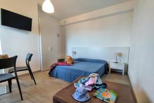 Posteľ alebo postele v izbe v ubytovaní Testa di Monaco - Basic Beach Accommodations