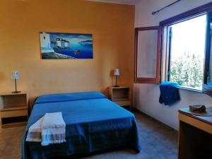 Posteľ alebo postele v izbe v ubytovaní Testa di Monaco - Basic Beach Accommodations