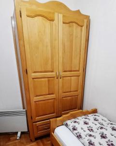 Postel nebo postele na pokoji v ubytování Tara Apartmani Malešević - 1