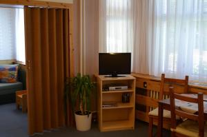 TV a/nebo společenská místnost v ubytování Ubytování v soukromí Rázlovi