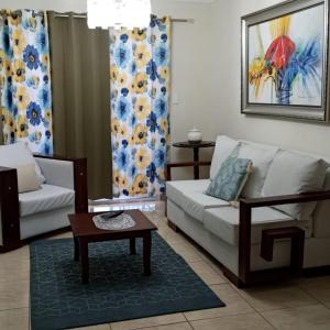 Χώρος καθιστικού στο CONFORTABLE first floor en santiago RD