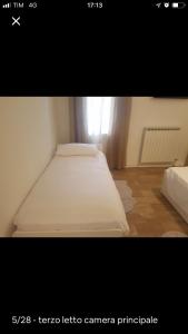 Cama ou camas em um quarto em Center, 15 minutes from Venice, Parking Miranese