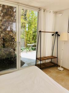 Voodi või voodid majutusasutuse Chambre d’hôte vue mer toas