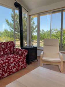 A seating area at LA ANTIGUA CASA DEL ASTRONOMO Casa Rural