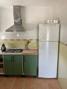 A kitchen or kitchenette at LA ANTIGUA CASA DEL ASTRONOMO Casa Rural