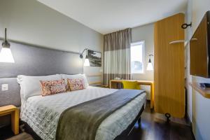 Voodi või voodid majutusasutuse Rio hotel by Bourbon Indaiatuba Viracopos toas