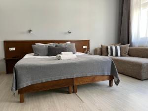 Posteľ alebo postele v izbe v ubytovaní Kamienica 22 Old Town