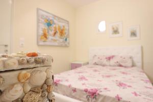 Postel nebo postele na pokoji v ubytování Holiday Apartment Siviri