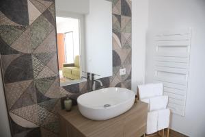 Koupelna v ubytování Le Suite del Pastore + 23 fotografií
