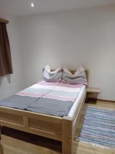 Postel nebo postele na pokoji v ubytování MIKAS HAUS