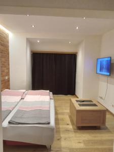 Postel nebo postele na pokoji v ubytování MIKAS HAUS