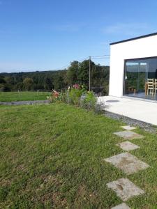 Photo de la galerie de l'établissement L'Harmonie du Jardin Gîte, à Chevetogne
