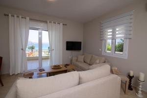 TV a/nebo společenská místnost v ubytování Sunset Resort