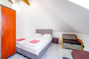 Postel nebo postele na pokoji v ubytování Dobre smaki at Wczasowa8 sea resort
