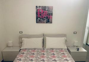 Ένα ή περισσότερα κρεβάτια σε δωμάτιο στο Casa vacanza Memole