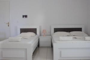 Postel nebo postele na pokoji v ubytování Orea Hotel