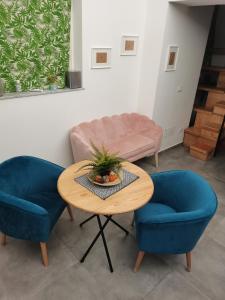 A seating area at Cammileddi mini suite