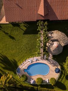 Bazén v ubytování Hotel Brisas La Gaviota Mariquit-Tolima nebo v jeho okolí