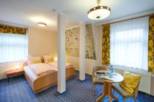 Un pat sau paturi într-o cameră la Hotel Vierenstraße