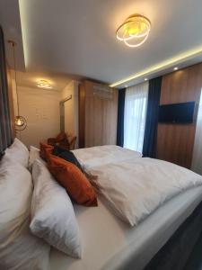 Un pat sau paturi într-o cameră la COCO