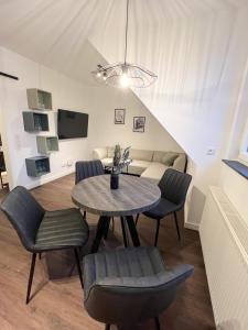 TV a/nebo společenská místnost v ubytování Dyke Appartements