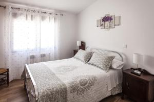 Postel nebo postele na pokoji v ubytování Casa Rural La Fontanita