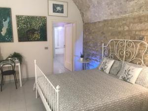 Postel nebo postele na pokoji v ubytování Stella del centro