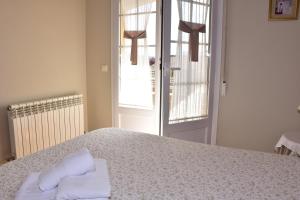 Postel nebo postele na pokoji v ubytování CASA RAICHU