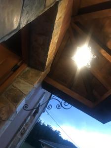 a light in the ceiling of a house at La Casa del Castaño in Vegadeo