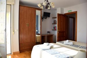 Postel nebo postele na pokoji v ubytování CASA RAICHU