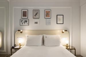 Posteľ alebo postele v izbe v ubytovaní Lisboa Pessoa Hotel